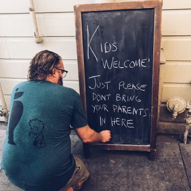 Man writing on a-frame, 
